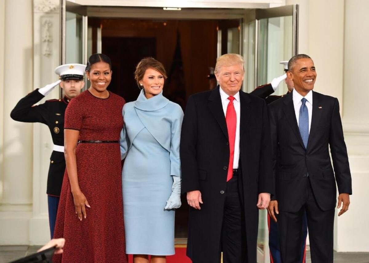 Melania Trump, second from left, wore an ensemble from the Ralph Lauren Collection on Inauguration Day.