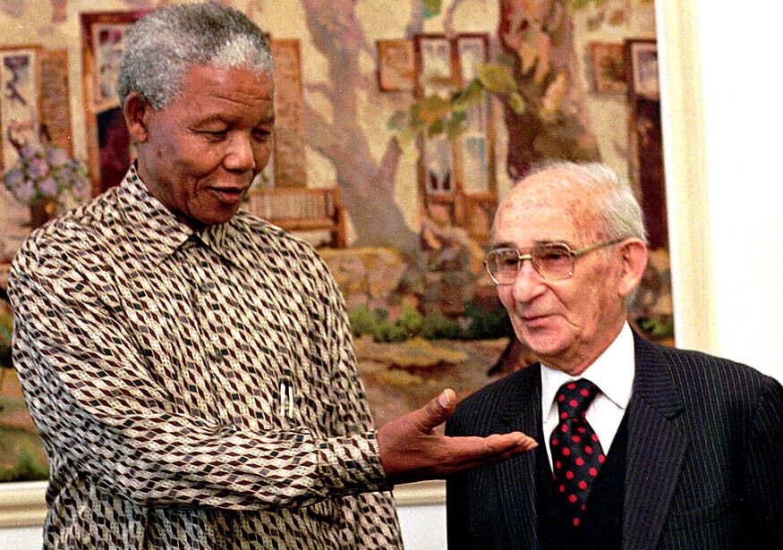 President Mandela at his Pretoria residence with Percy Yutar in 1995, who as a state prosecutor 31 years earlier sentenced Mandela to life in prison.