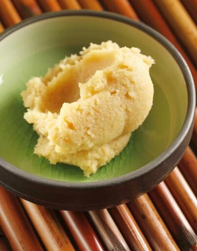 A scoop of miso for use in miso pork chops and miso marinated vegetables.
