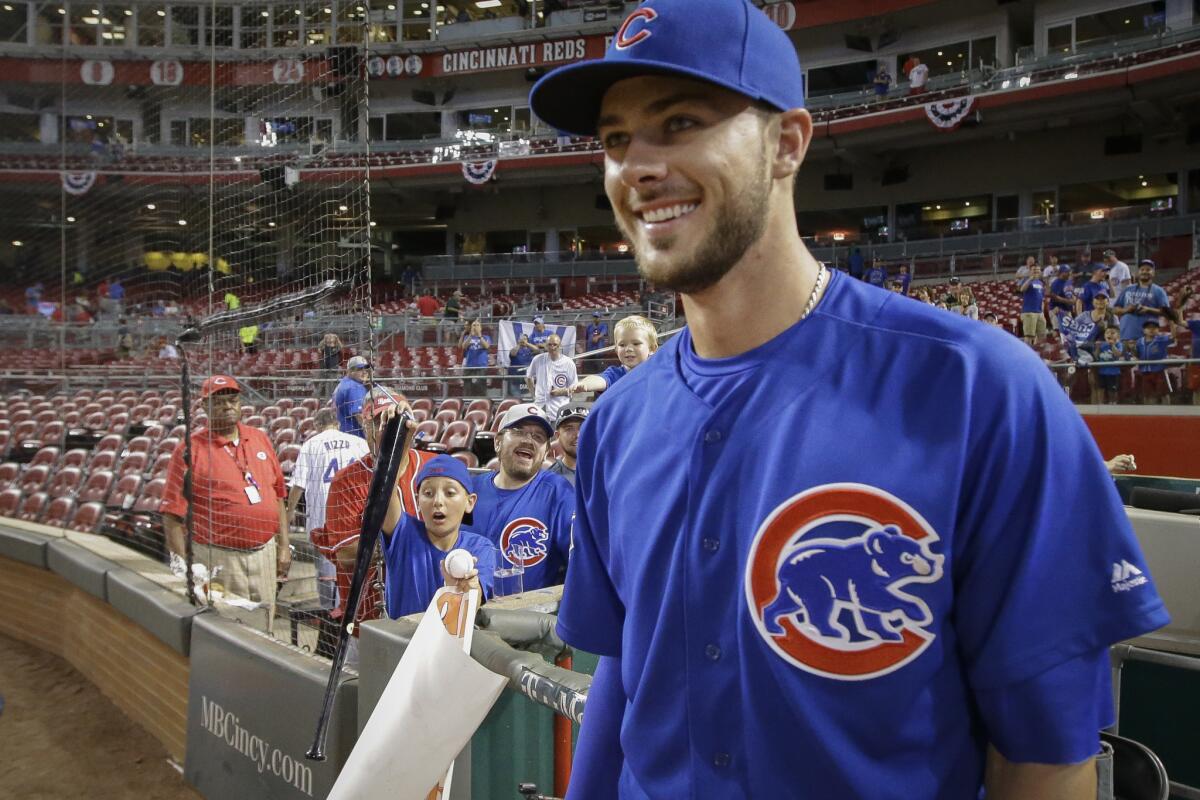 Kris Bryant had reason to smile after his three-homer game on Monday.
