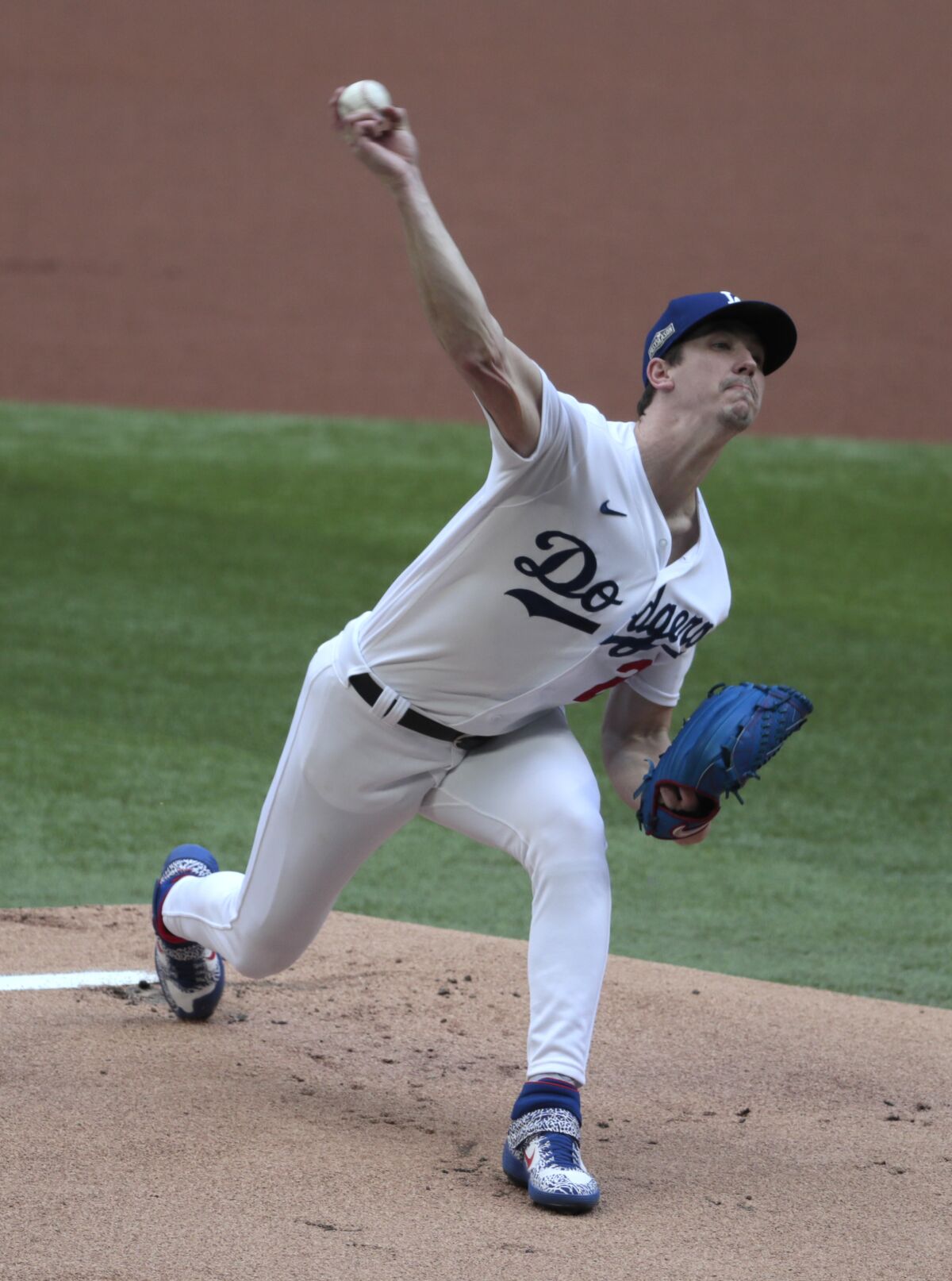 Dodgers starting pitcher Walker Buehler delivers during the first inning against the Atlanta Braves.