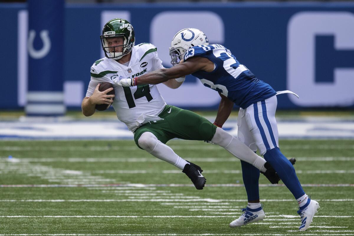 Indianapolis Colts cornerback Kenny Moore (23) sacks New York Jets quarterback Sam Darnold.