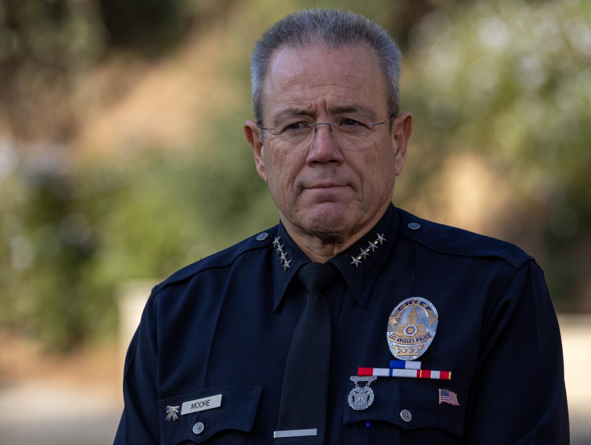 LAPD Chief Michel Moore pictured outdoors from the chest up