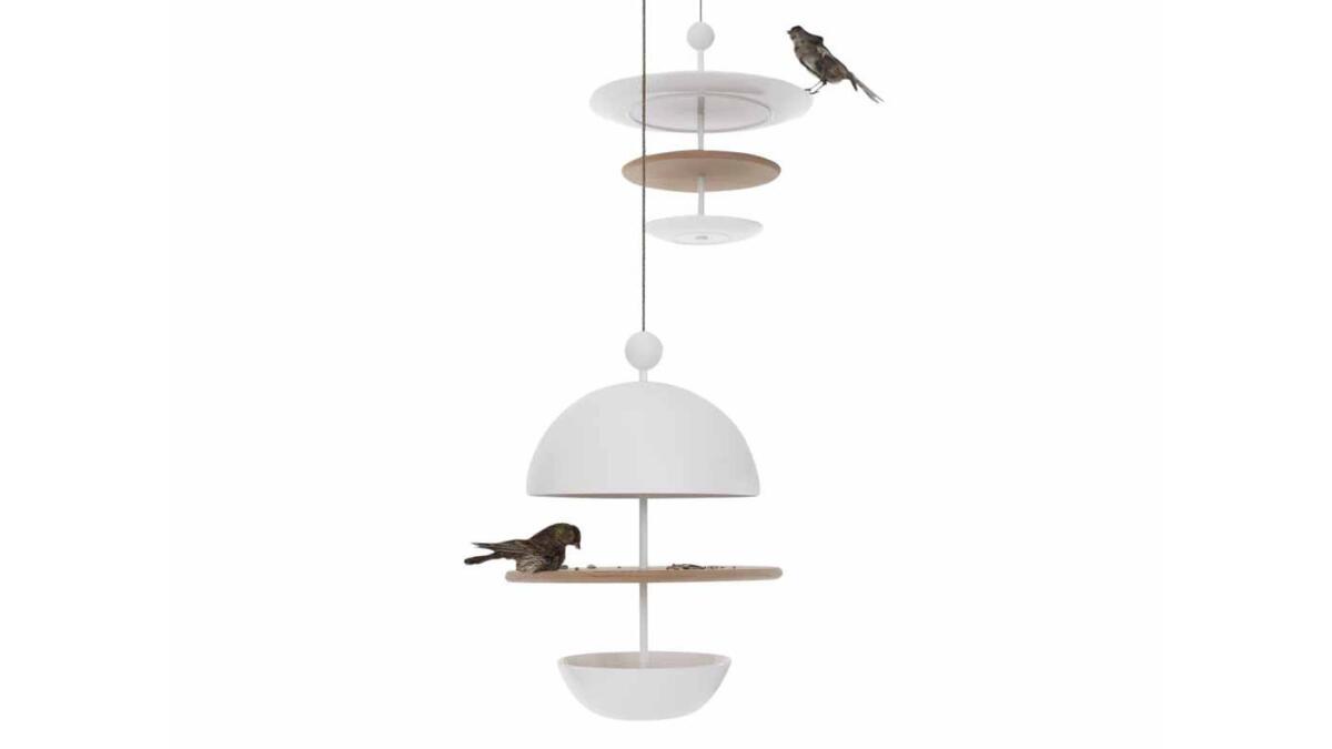 Designed by Studio Frederik Roije, the Dish of Desire bird feeder is a sleekly contemporary modular system of weather-resistant porcelain, aluminum and red cedar perches and dishes. From $210 at www.ahalife.com.