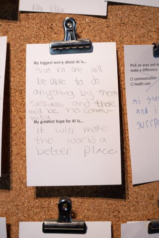 Notes written by people visiting the Exploratorium's "Adventures in AI" exhibition list their greatest worries and hopes