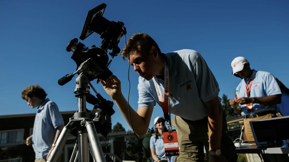 Students from Williams College accompany Jay Pasachoff as he leads the solar eclipse observation in Salem, Ore.