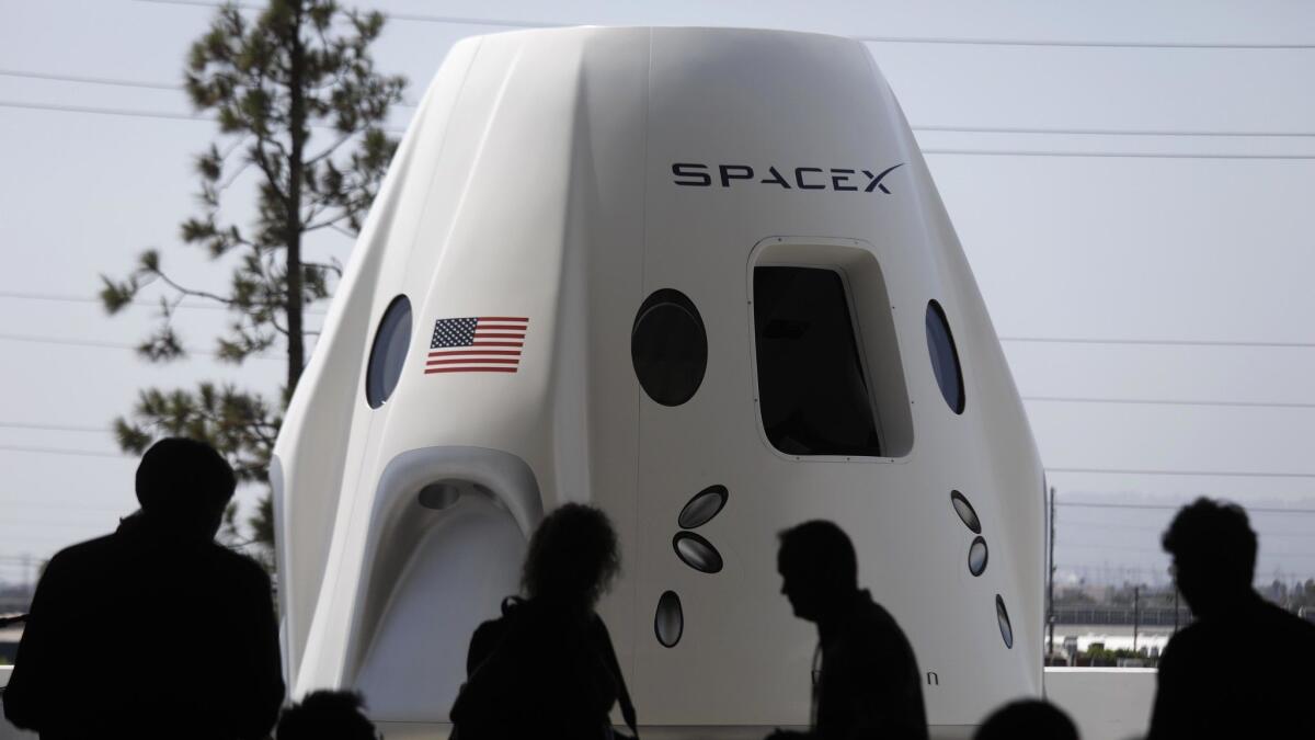 A mock-up of the Crew Dragon spacecraft was on display for members of the media at SpaceX in Hawthorne on Aug. 13.