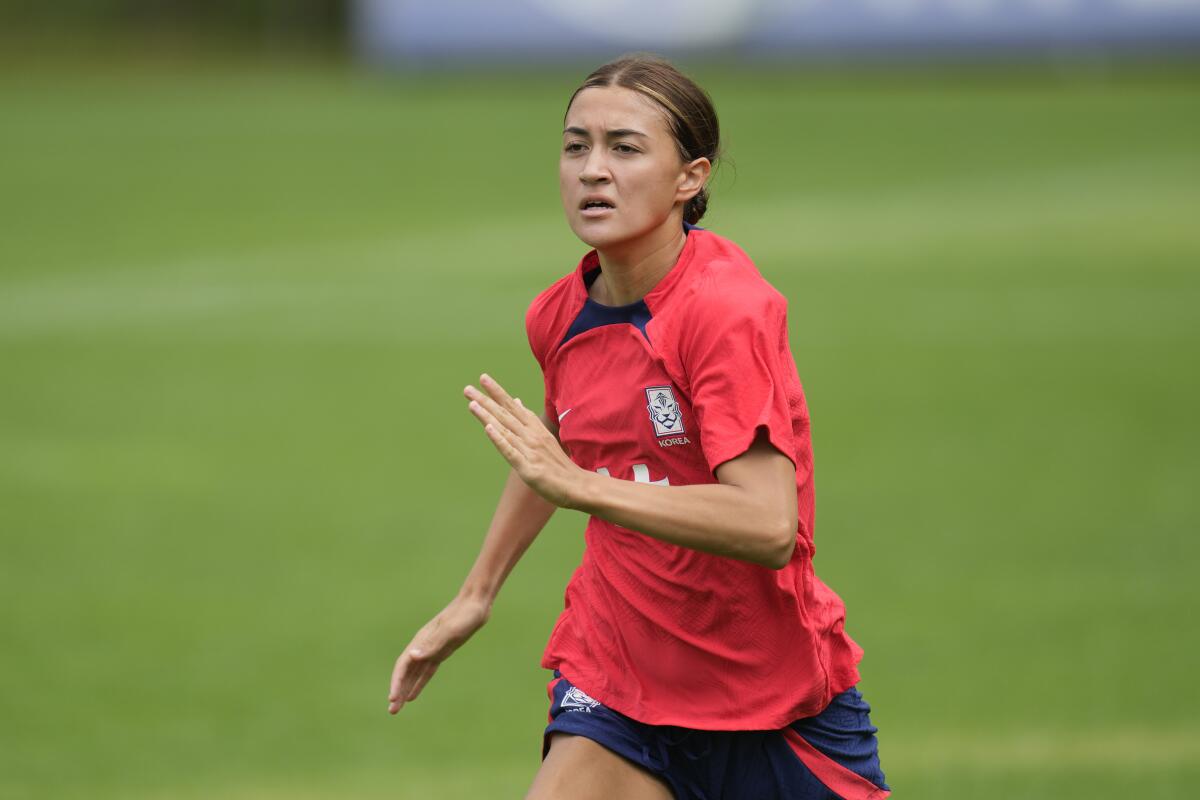 Casey Phair warms up during a training session for South Korea's Women's World Cup team in July.