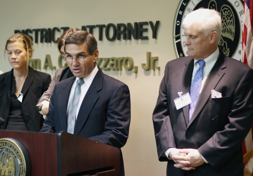 FILE - In this May 12, 2014 file photo, Orleans Parish District Attorney Leon Cannizzaro speaks at a news conference in New Orleans. Lawyers for the district attorney are asking a federal appeals court to end a lawsuit centered on his office having used fake subpoenas to coerce uncooperative witnesses. Attorneys representing Cannizzaro and some of his staff were set to argue Wednesday, Feb. 5, 2020, that the prosecutors are legally immune from claims made in a 2017 lawsuit by criminal justice advocates. The case is before a three-judge panel of the 5th U.S. Circuit Court of Appeals. (AP Photo/Janet McConnaughey, File)