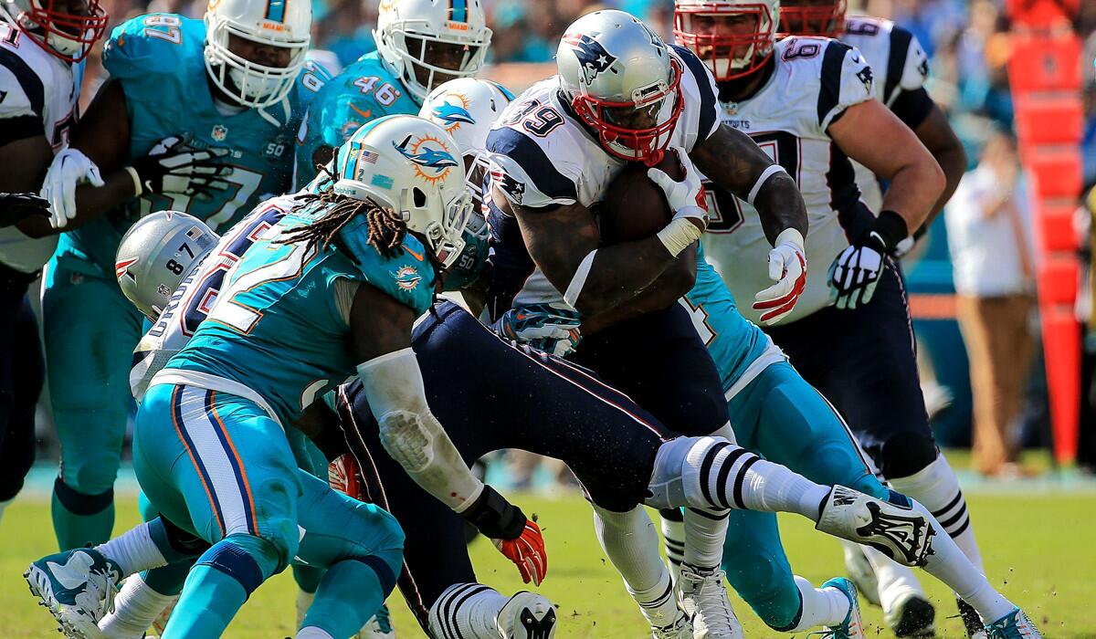 New England Patriots' Steven Jackson (39) in action during the first half against the Miami Dolphins on Sunday.