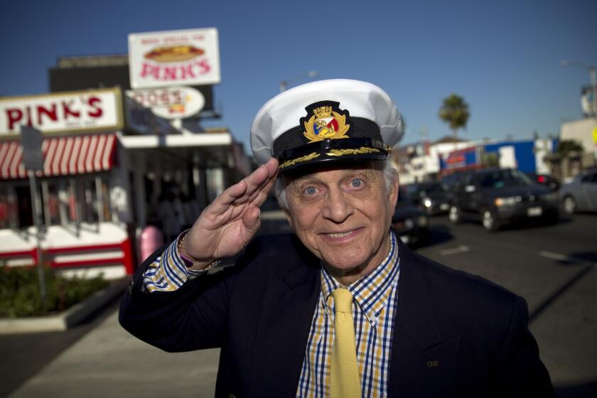 Gavin MacLeod, who is best known as Capt. Stubing on "The Love Boat" and also Murray on "The Mary Tyler Moore Show," is shown at Pink's.