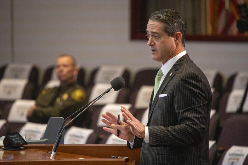 SANTA ANA, CALIF. -- TUESDAY, MARCH 17, 2020: Orange County District Attorney Todd Spitzer addresses the Orange County supervisors during a discussion on the county's latest efforts to combat the coronavirus pandemic at the Hall of Administration in Santa Ana, Calif., on March 17, 2020. (Allen J. Schaben / Los Angeles Times)