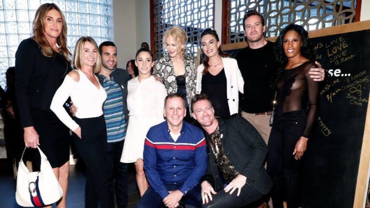 From left: Caitlyn Jenner, Nadia Comaneci, Danell Leyva, Aly Raisman, Nicole Kidman, Elizabeth Chambers, Armie Hammer and Olympic athlete Kristi Castlin and (front left) an event guest and Charley Cullen Walters attend Gold Meets Golden.