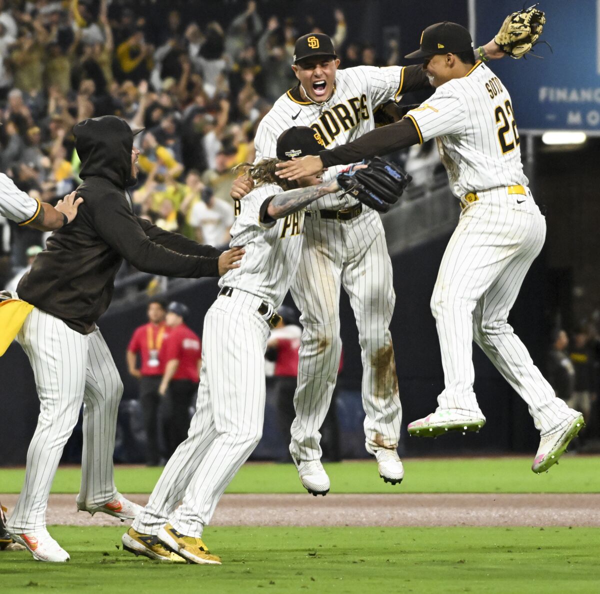 San Diego Padres players celebrate after defeating the Dodgers in Game 4 of the NLDS.