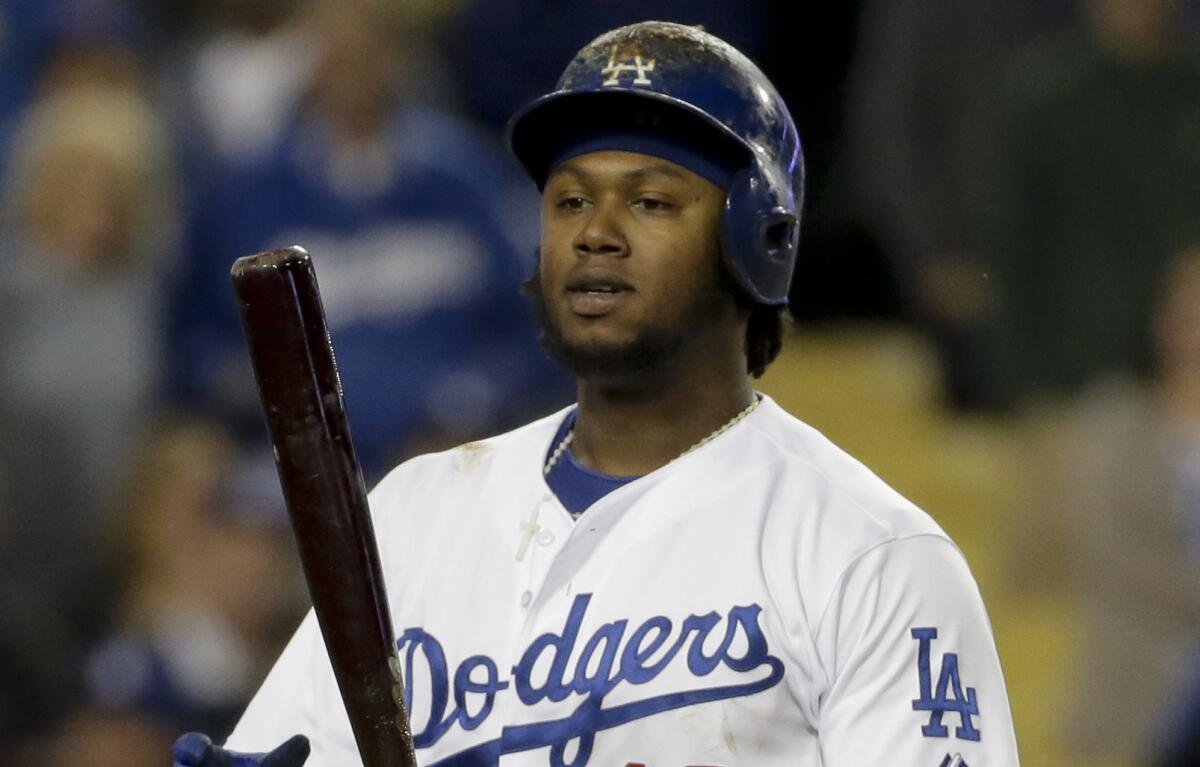 Dodgers shortstop Hanley Ramirez bats during a game against the Arizona Diamondbacks on Friday. Ramirez has been unable to replicate the kind of batting numbers that made him an outstanding offensive player in 2013.