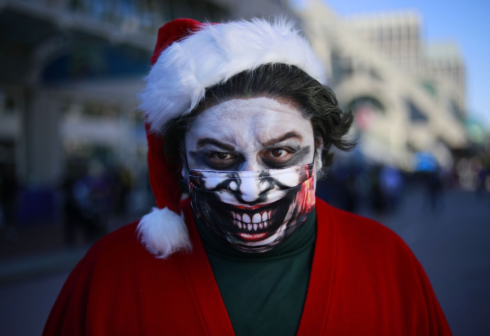 Adan Castillo of Hemet dressed as the Santa Joker at Comic-Con Special Edition.