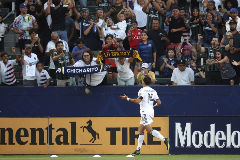 Galaxy forward Javier Hernández runs toward the corner after scoring a first-half goal Aug. 13, 2022.