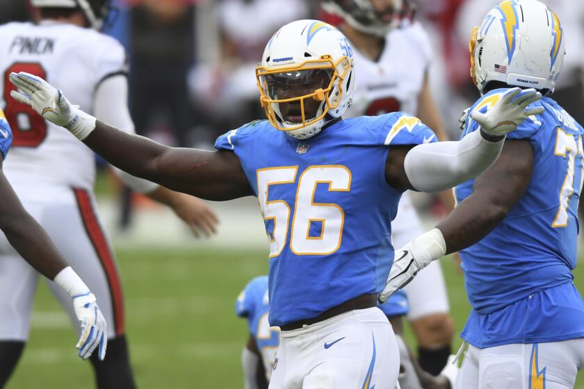 Los Angeles Chargers linebacker Kenneth Murray (56) celebrates after Tampa Bay Buccaneers.