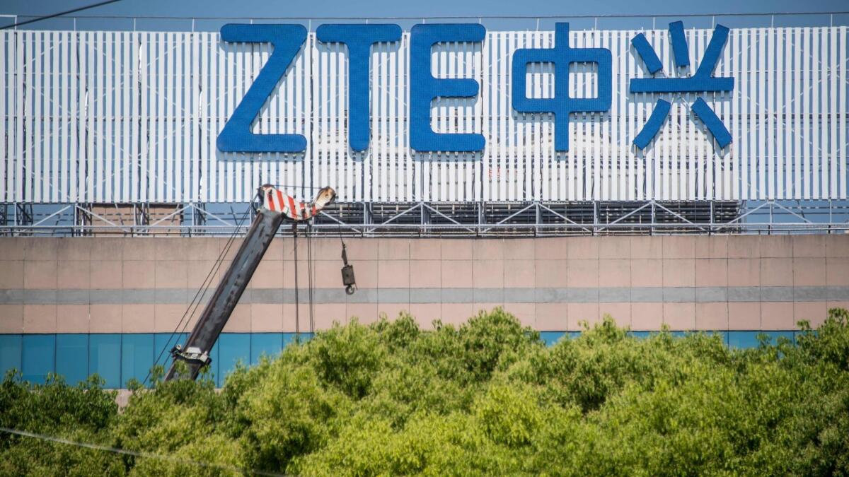 The ZTE logo is displayed on an office building in Shanghai, China, this month.