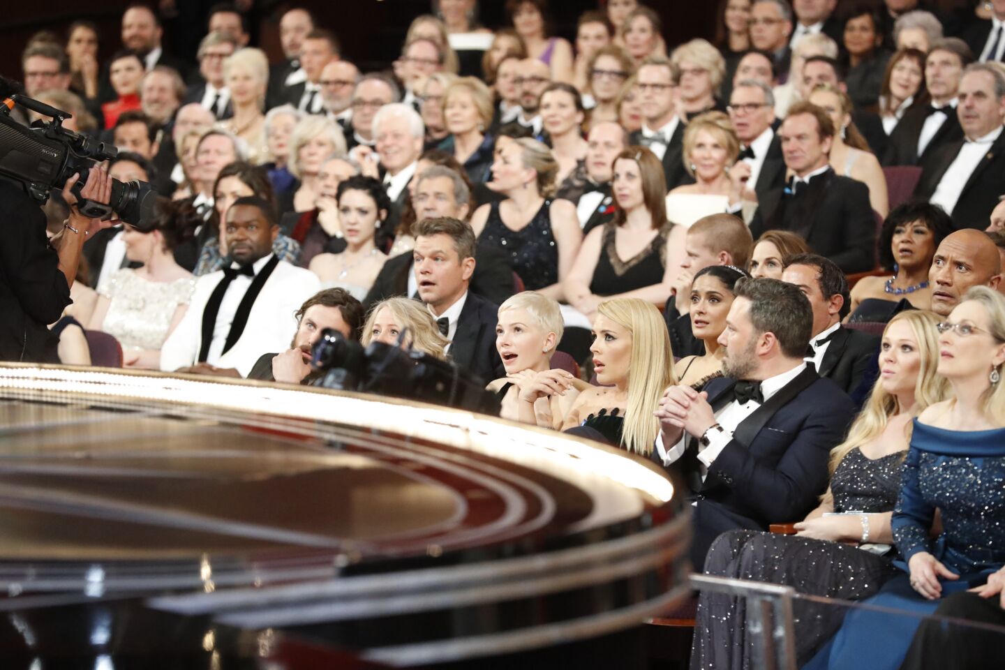 The audience at the Dolby Theatre is stunned after the best picture award is mistakenly announced as "La La Land" instead of "Moonlight" during the 89th Academy Awards.