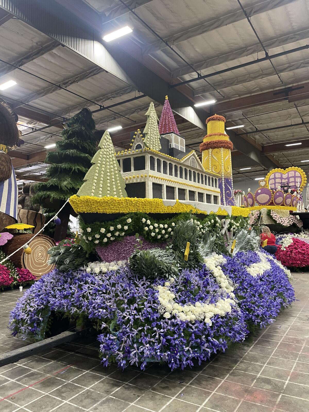 A finished section of the "Jingle on the Waves" float pays homage to the Balboa Pavilion.