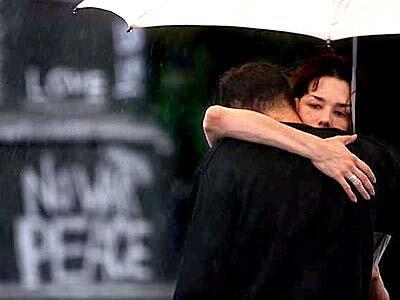 Strangers embrace at Union Square