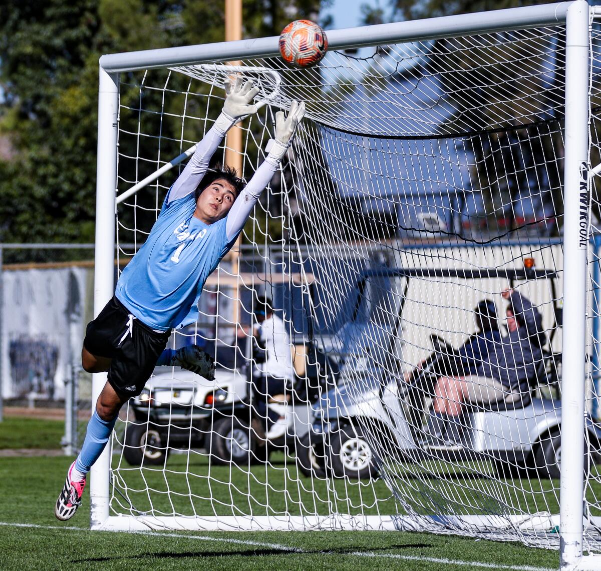 El Camino Real's Rey Lara is unable to stop game-winning goal from Birmingham's Steven Ramos that made the score 3-2.