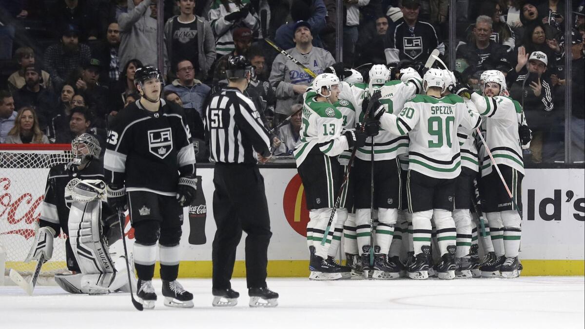 Dallas Stars players celebrate a 4-3 overtime win over the Kings on Thursday at Staples Center.
