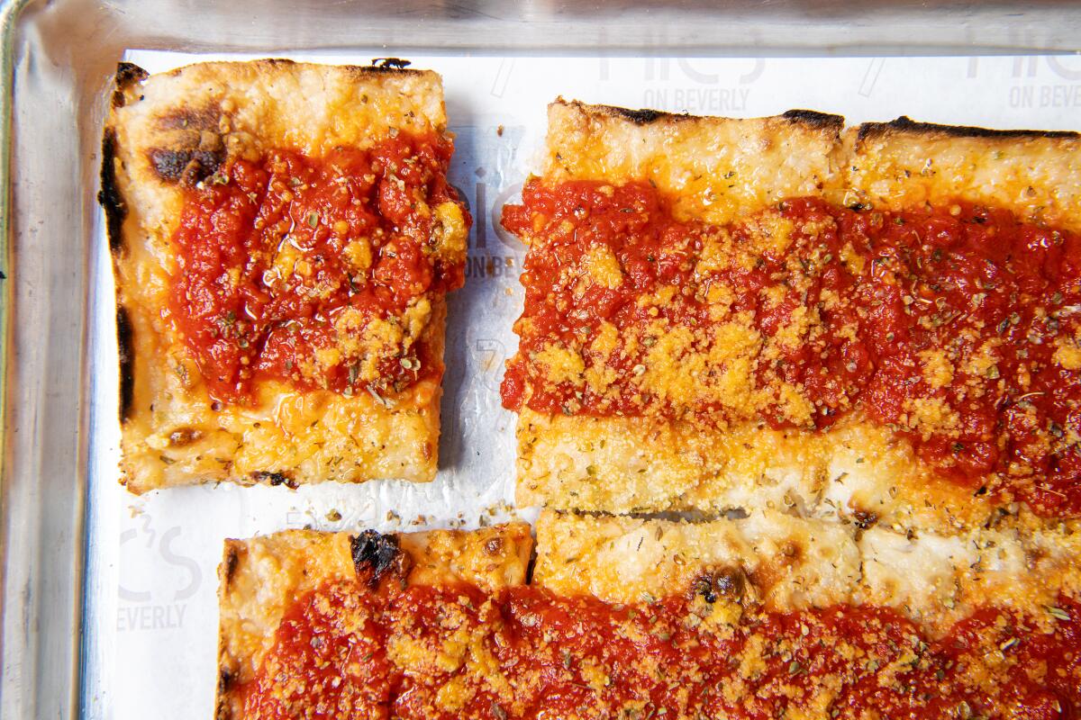 An overhead photo of a square, Detroit-style pizza from Nic's on Beverly