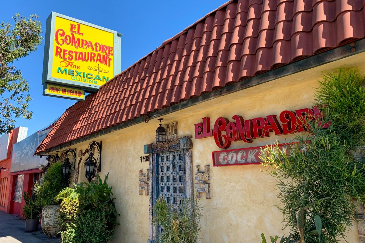 Exterior shot of a restaurant with the sign reading El Compadre Restaurant