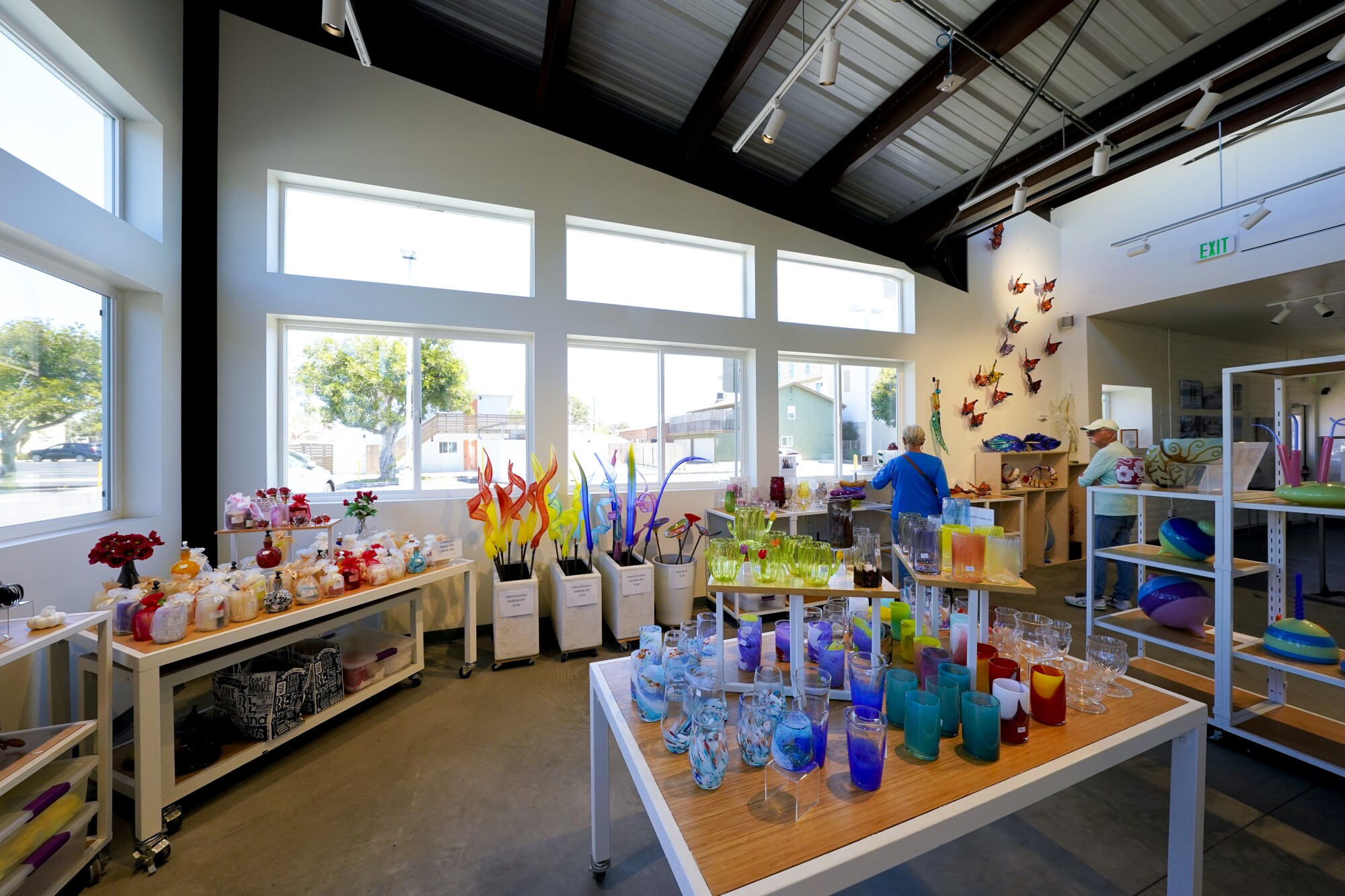 Glass crafts are sold in the showroom.