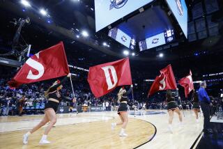 Boston, MA- March 28: San Diego State cheerleader run on the court before playing UConn during a NCAA Tournament Sweet 16 game at the TD Garden on Wednesday, March 28, 2024 in Boston, MA. (K.C. Alfred / The San Diego Union-Tribune)