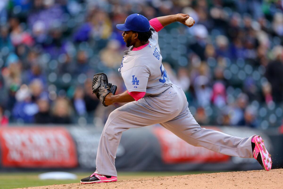 Dodgers reliever Pedro Baez was placed on the disabled list after straining his pectoral muscle.