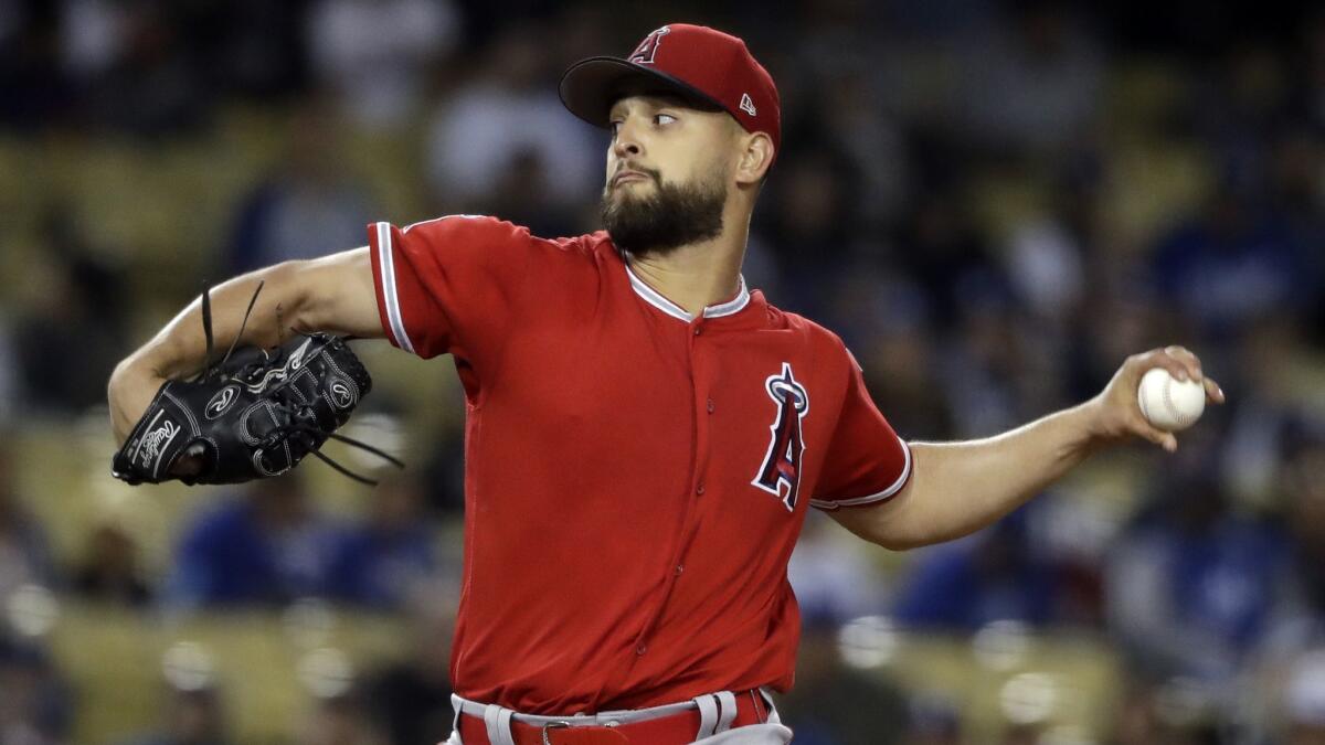 Angels starting pitcher Patrick Sandoval throws against the Dodgers during the first inning of a preseason game on March 26, 2019, in Anaheim.