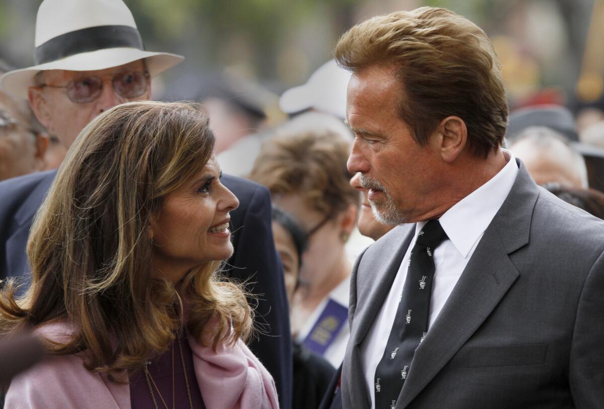 Maria Shriver and Arnold Schwarzenegger attend USC commencement in May 2012, where one of their children was believed to be graduating.