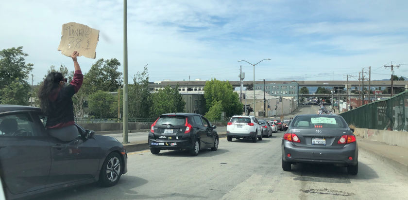 A caravan of protesters in Oakland