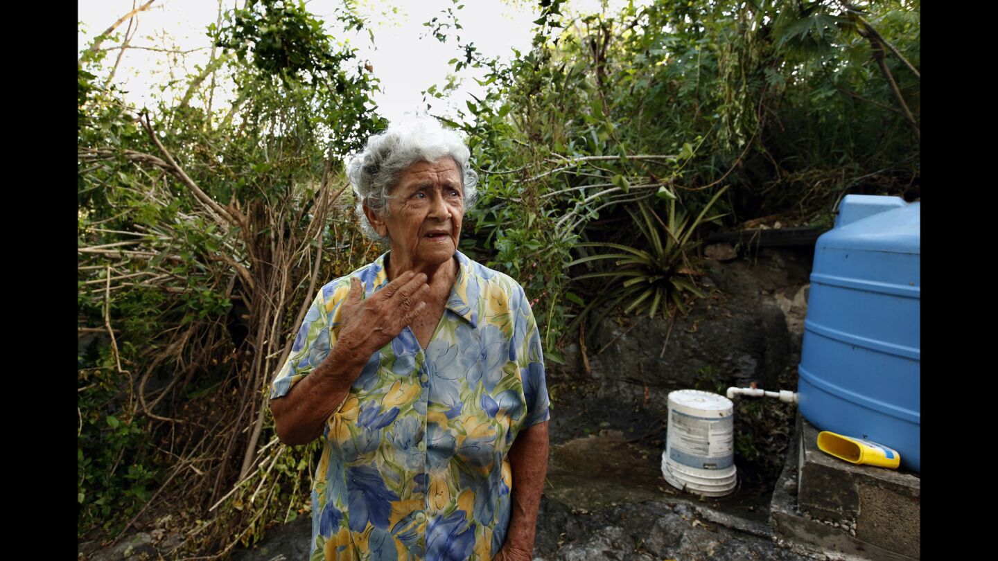 Catalina Melendez Jusino, 91, has been drinking rainwater since Hurricane Maria hit more than 10 days ago. She finally received water donations on Friday.