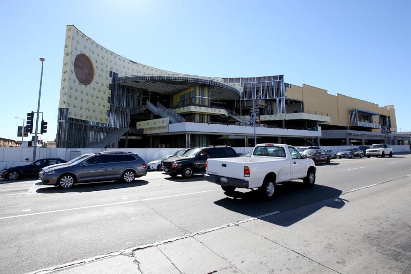 The Los Angeles City Council voted Wednesday to alter zoning rules to allow construction to resume on this Target development in Hollywood. A neighborhood opposition group said it would sue to once again halt the project.