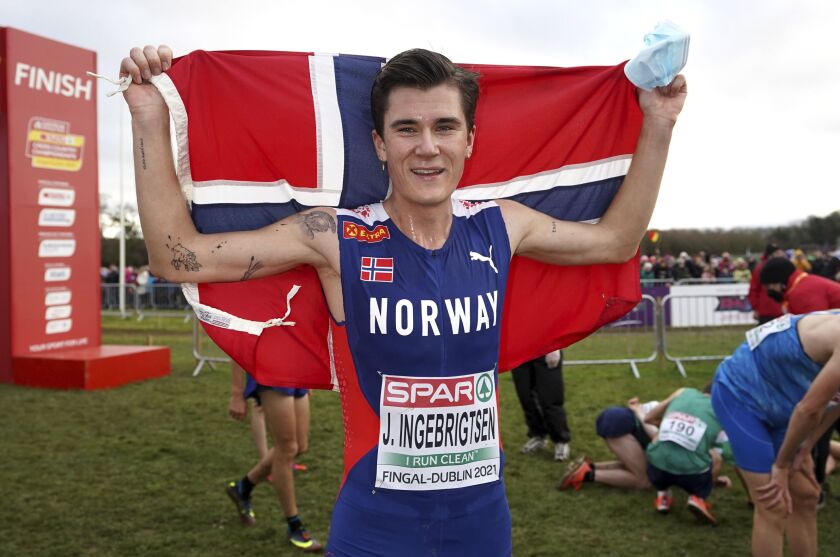 Norway's Jakob Ingebrigtsen celebrates after winning an event at the European Cross Country Championships.