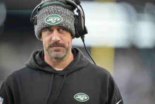 New York Jets quarterback Aaron Rodgers before an NFL football game against the Miami Dolphins