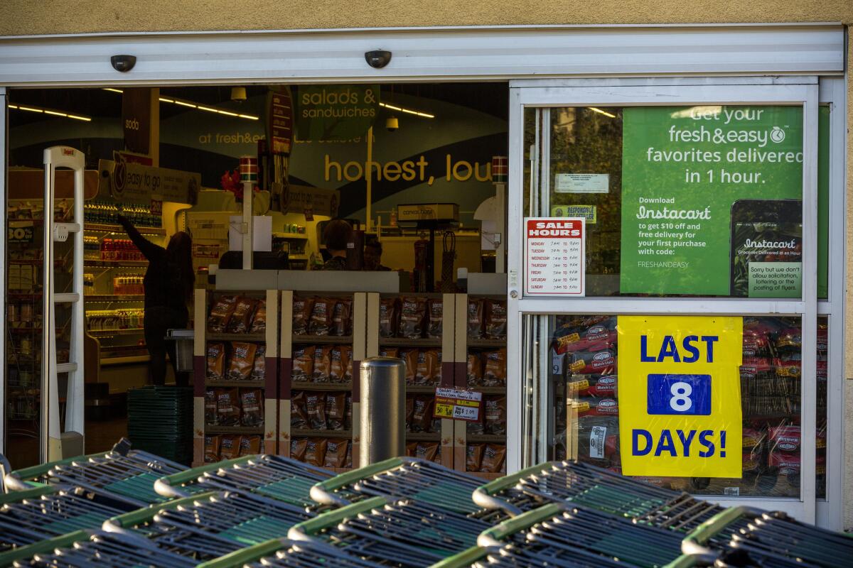 A sign indicating the last eight days of the store's opening is posted on the door of a Fresh & Easy. The chain filed for bankruptcy protection last month and is closing its stores by mid-November.