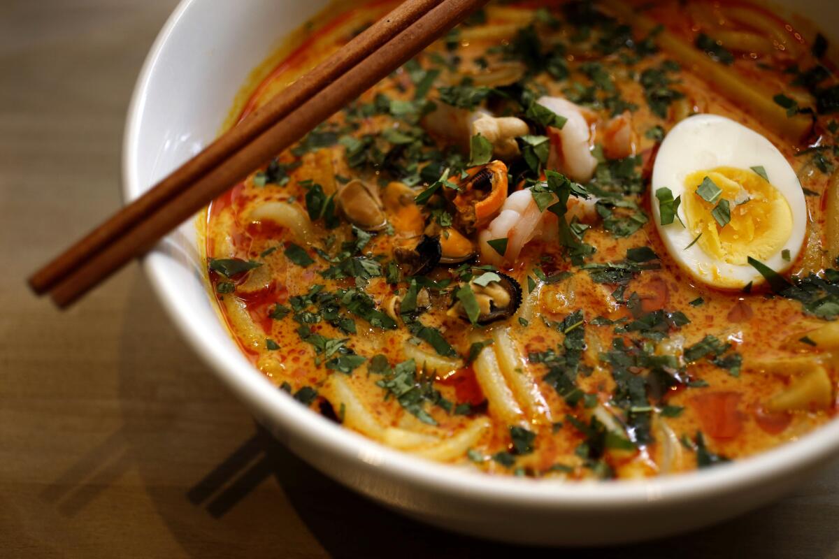 A bowl of Laksa, a spicy coconut-seafood soup is one of the traditional Asia dishes that appears on the menu at Cassia.