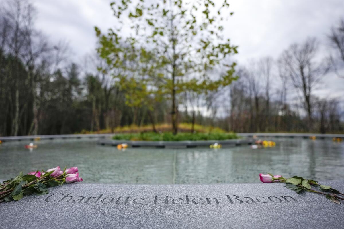 Flowers next to the name of Charlotte Helen Bacon, one of those killed at Sandy Hook.