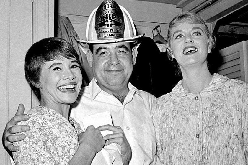 Tom Bosley poses with cast members Pat Stanley, left, and Ellen Hanley after the opening performance of the Broadway musical "Fiorello!" in 1959. He won a Tony Award the next year for best featured actor for his breakthrough role as New York's legendary Mayor Fiorello LaGuardia. See full story