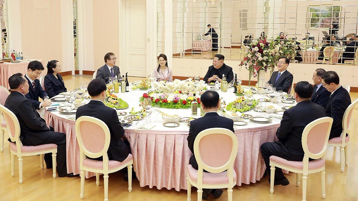 In a photo provided by the South Korean government, North Korean leader Kim Jong Un meets with a South Korean delegation in Pyongyang, North Korea, on March 5.