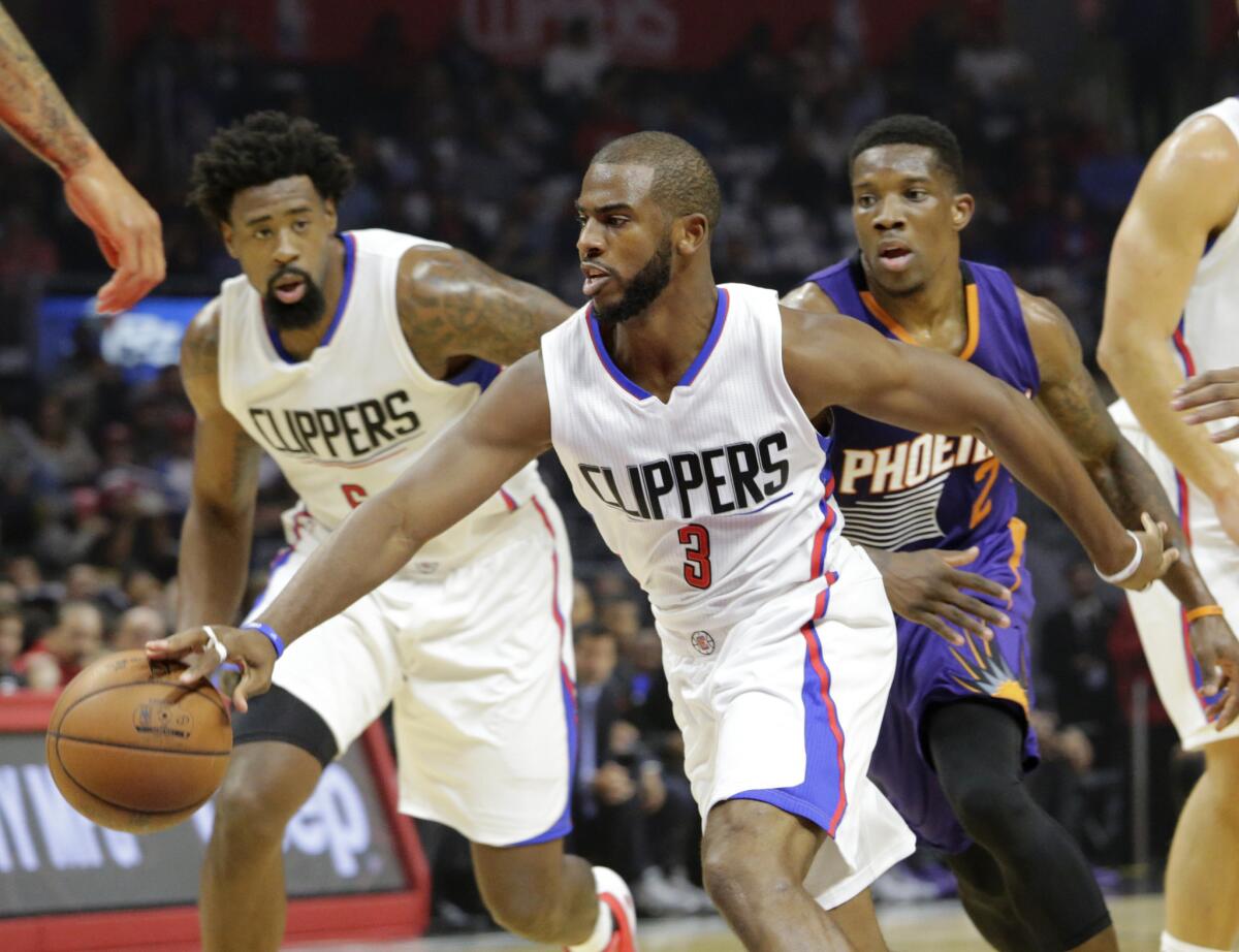 Clippers point guard Chris Paul (3) leads the charge on a fast break attempt in the first half against the Suns on Nov. 2.