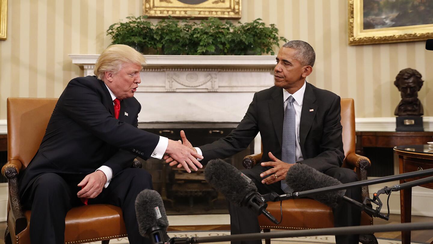 President-elect Donald Trump shakes hands with President Obama in the Oval Office of the White House in Washington, D.C., on Thursday.