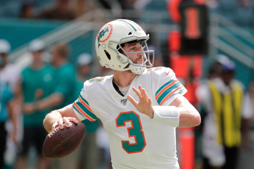 Miami Dolphins quarterback Josh Rosen (3) looks to pass, during the second half at an NFL football game against the New England Patriots, Sunday, Sept. 15, 2019, in Miami Gardens, Fla. (AP Photo/Lynne Sladky)