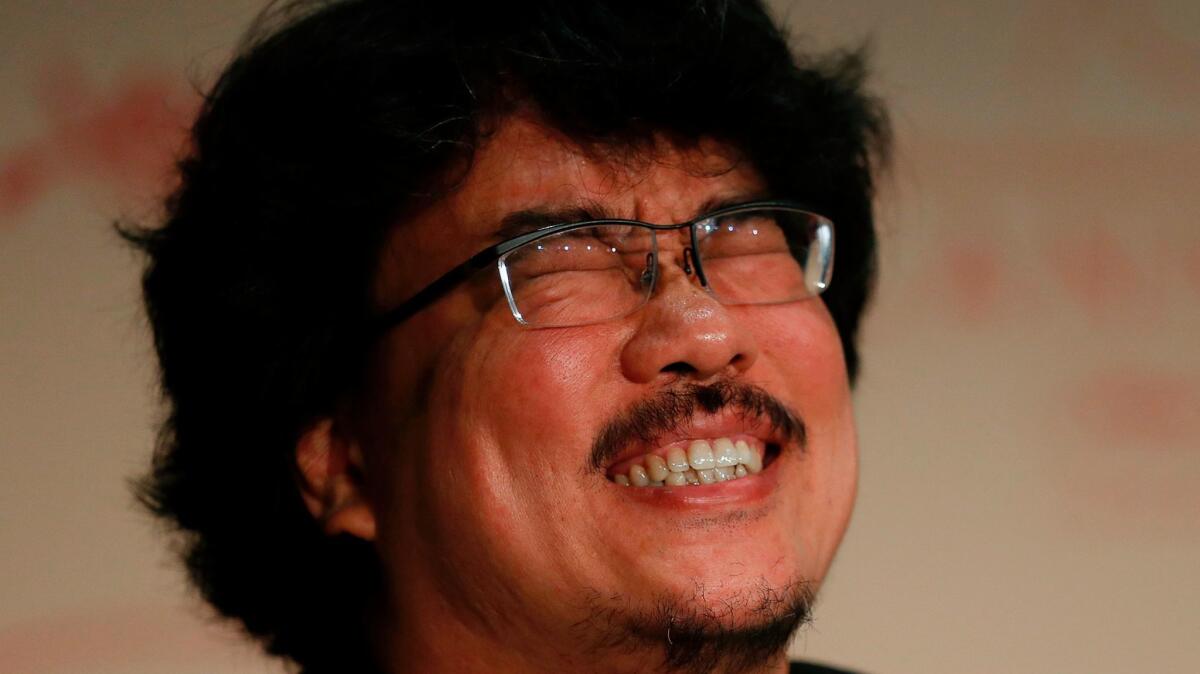 South Korean director Bong Joon-ho reacts during a May 19 conference for the film 'Okja' at the Cannes Film Festival.