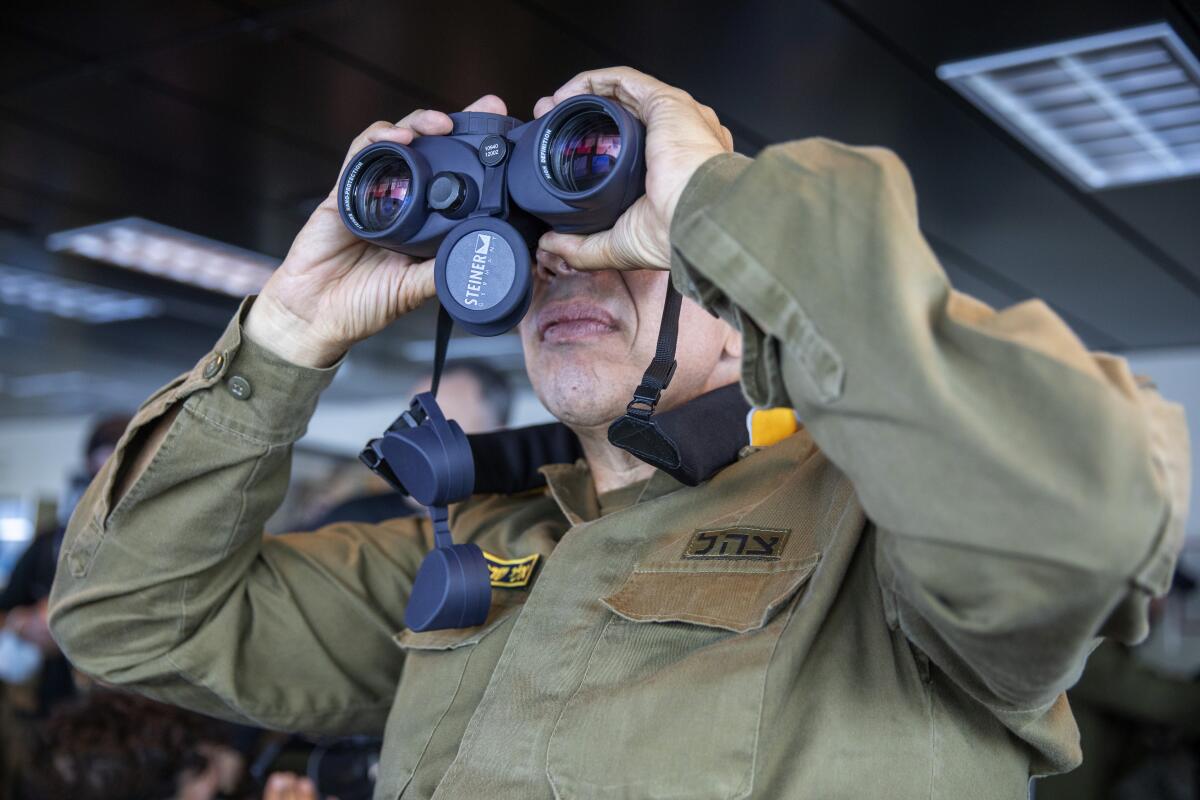 Vice Adm. Eli Sharvit looks out from aboard the Israeli Navy Ship Atzmaut in the Mediterranean Sea, Wednesday, Sept. 1, 2021. Speaking to The Associated Press days after completing his five-year term, Sharvit described Iranian activities on the high seas as a top Israeli concern and said the navy is able to strike wherever necessary to protect the country’s economic and security interests. (AP Photo/Ariel Schalit)